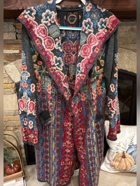 Johnny was heavily embroidered duster